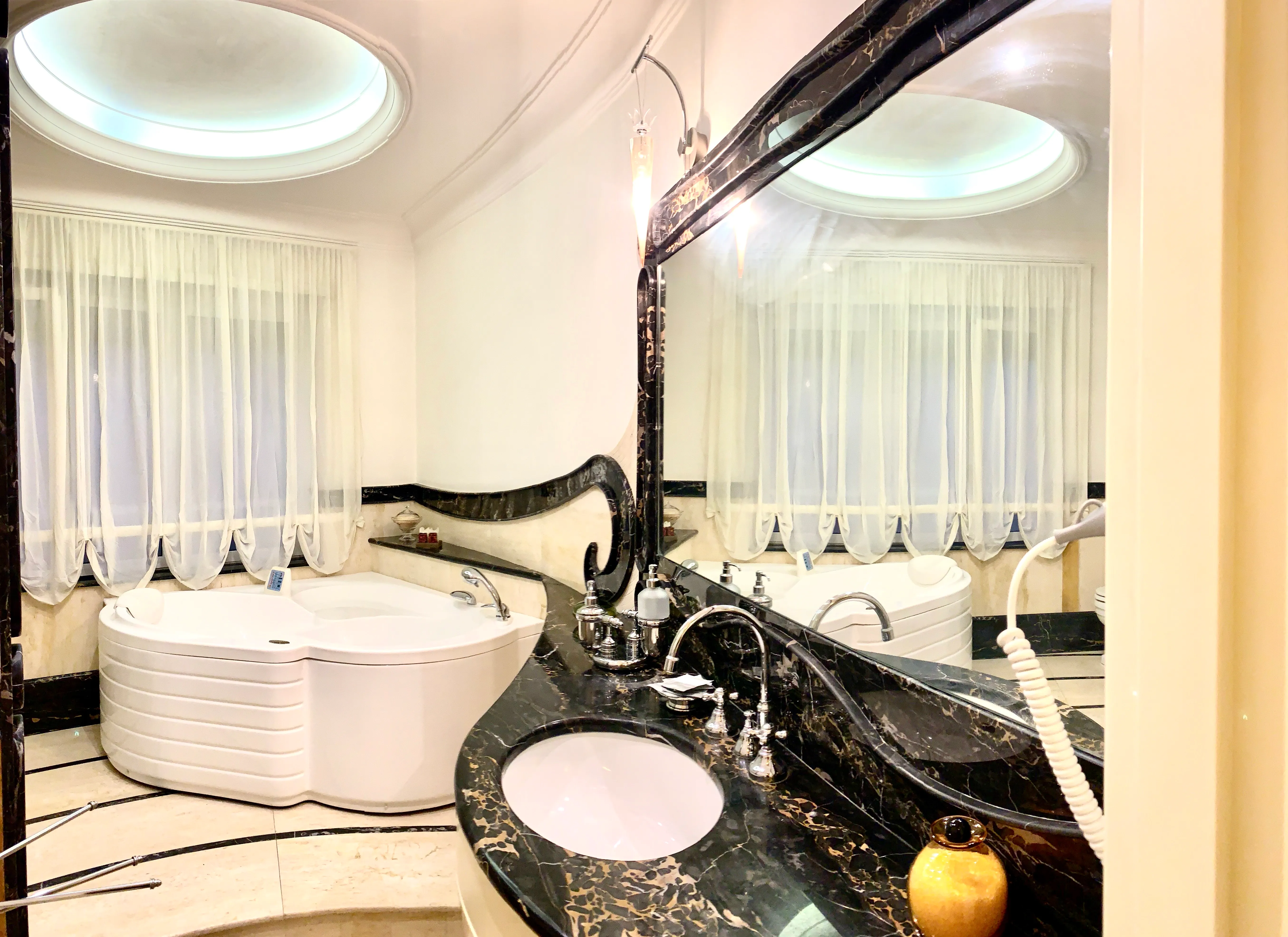 Suite Deluxe Room with whirlpool tub, marble bathroom detail