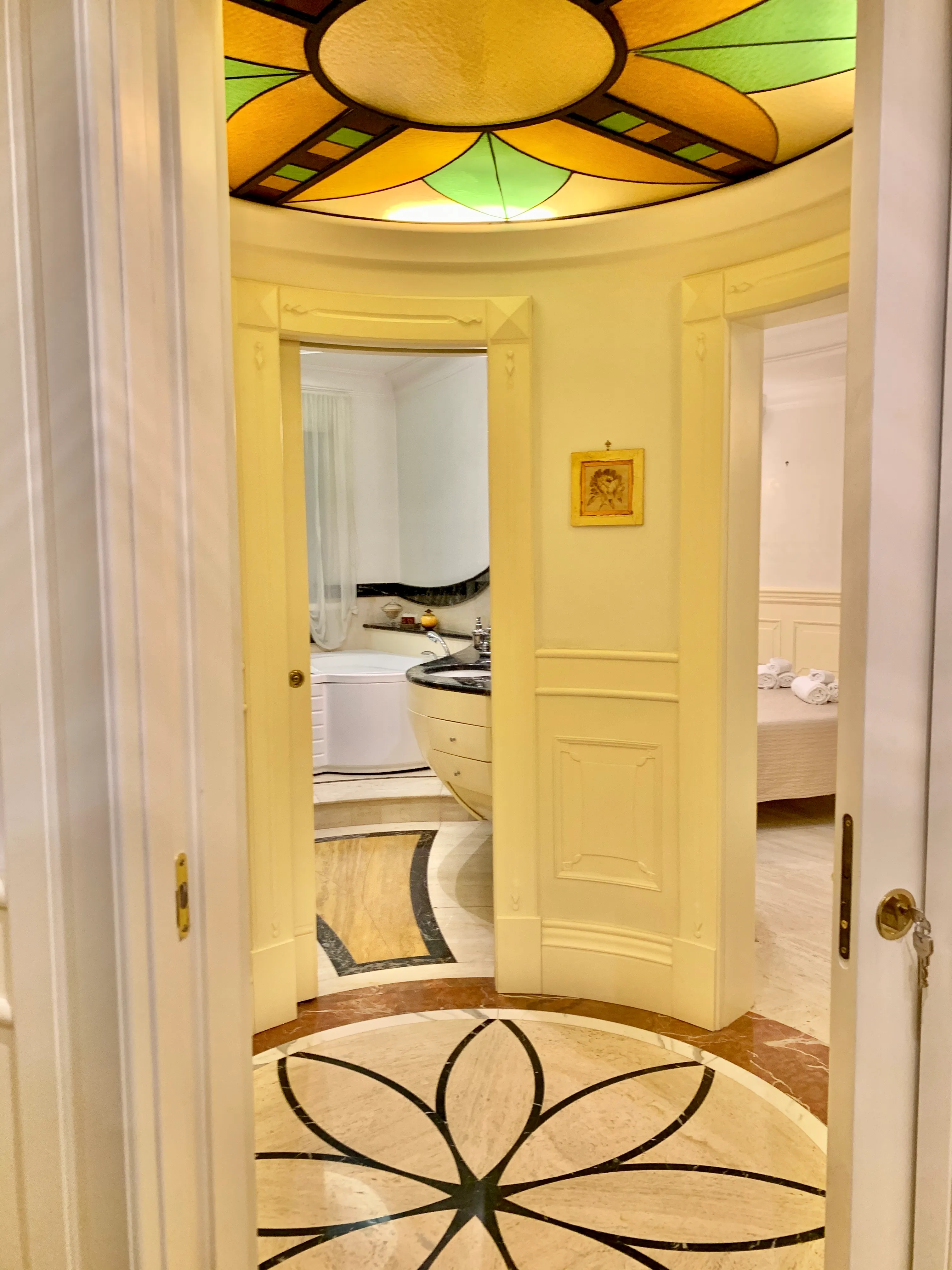 Suite Deluxe Room with whirlpool tub, bedroom detail